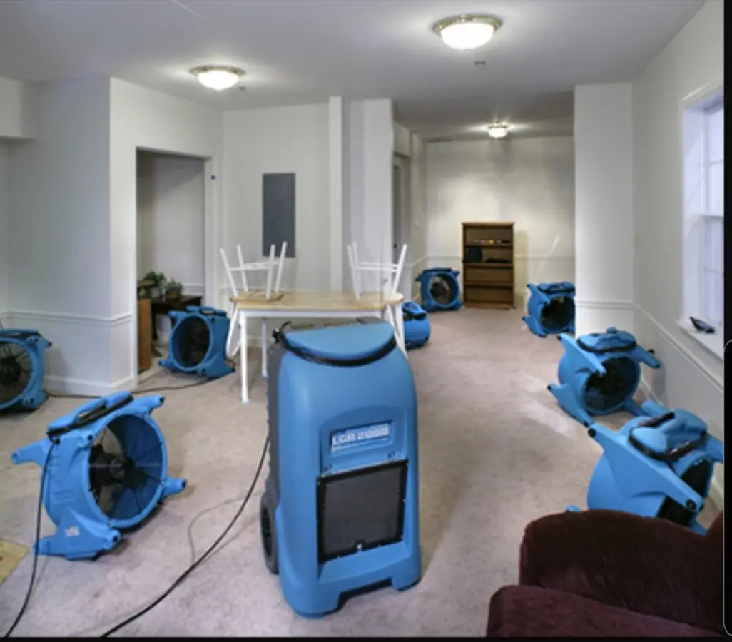 Air movers and dehumidifier setup for Water Damage Restoration in West Dundee